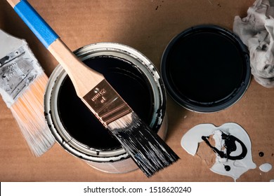 1 Inch Paintbrush Resting On Open Can Of Enamel Paint