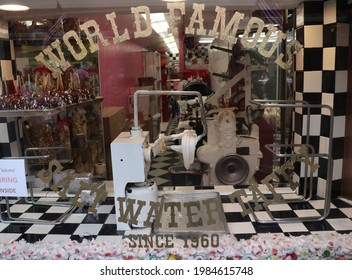 #1 Old, Fishermans Wharf, Monterey, CA 93940 USA 
June 1, 2021
The Window Of A Candy Store At Old Fisherman's Wharf. Salt Water Taffy Pulling Machine.