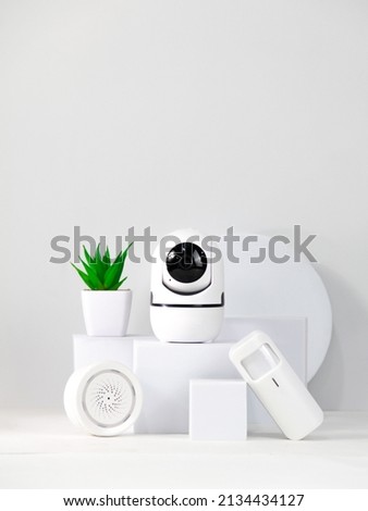 1 smarthome system package consisting of, Cctv, Siren Alarm, Motion Detector, for product photo project purposes