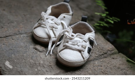 1 year old children's shoes. black white color - Powered by Shutterstock