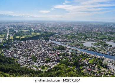 10 May 2019. Dramatic top view of the Srinagar city in kashmir around the river and lake. Amazing aerial view of the city. 