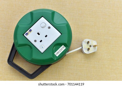 10 metres extention power socket on the yellow background. - Shutterstock ID 701144119