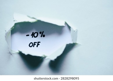 -10% off write on green torn paper - banner 