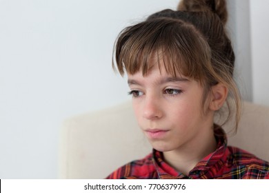 10 Year Old Girl Serious And Thoughtful. Horizontal Shot