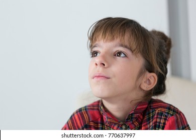 10 Year Old Girl Serious And Thoughtful. Horizontal Shot