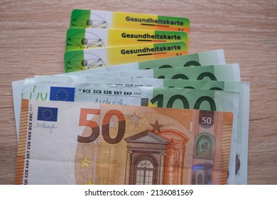 100, 50 Euro Banknotes, Frankfurt, Germany - January 2022: Leather Wallet With Public Health Insurance Cheaper, Insurance Card In German, Concept Medical Support In Country And On Trip To Europe