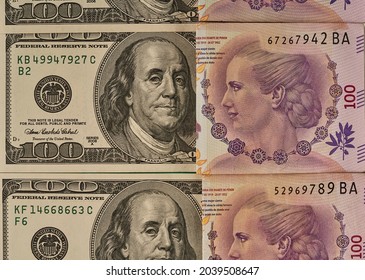 100 Argentine Peso Bill From Eva Peron Observing 100 Dollar Bill From Franklin