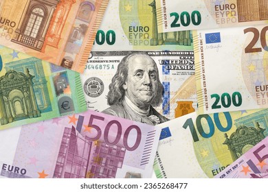 100 dollar and Euros banknotes. EU and USA trade. Euro and dollar rate.  - Shutterstock ID 2365268477