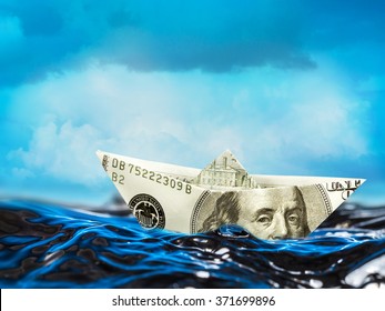 100 Dollar Paper Boat Floating On Stormy Waves