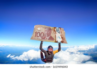 100 dollar. Parachutist is flying a flag of dollar bill. National investment. Fly men in black suit. 
 - Powered by Shutterstock