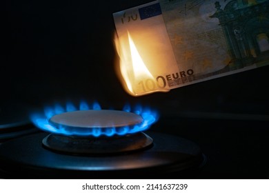 100 Euro Banknote On A Gas Burner. The Concept Of Cost For Natural Gas. Energy Crisis. High Cost, Gas Price. Sanctions