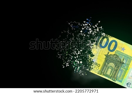 100 euro bills scattered in the air. money inflation concept. the disappearance of banknotes, hyperinflation. financial crash, euro banknotes, high living costs.