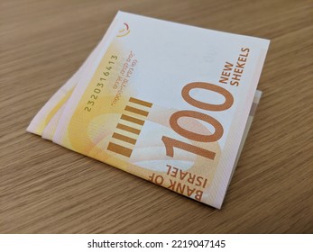 100 Israeli shekels bills banknotes. Finance. Jackpot, lottery. Money of Israel. Israeli new shekel bills. ILS banknotes. 100 shekels - Shutterstock ID 2219047145