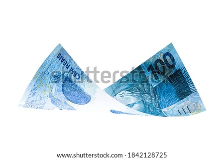 100 reais banknotes falling, one hundred reais banknote from brazil on isolated white background