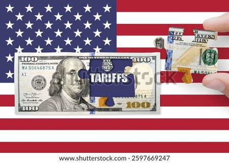 100 US dollar note on a USA flag with word TARIFFS. USA trade, duty, customs and tariffs war. Economic inflation, deflation or stagflation 