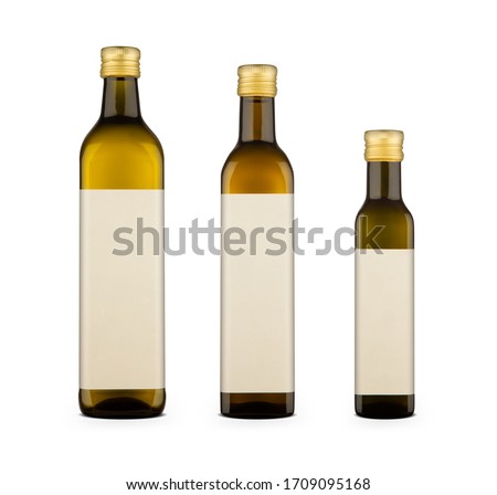 1000 ml, 750 ml and 250 ml olive oil bottles with blank labels with copy space isolated on white background