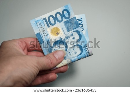 1000 Philippine peso banknote, paper money. Philippines financial system. Inflation and payment concept.