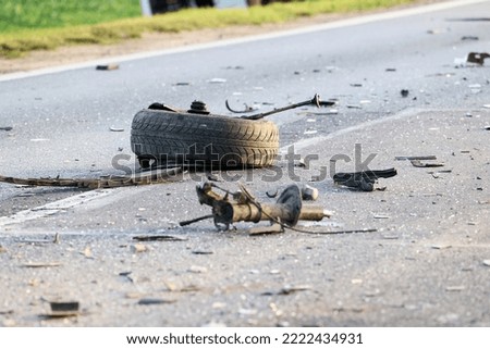 10.04.2022 wroclaw, poland, Scattered car parts after a road accident.
