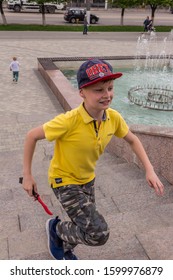 10.05.2019, Tula, Russia. Two Boys Running Up And Down By Stairs. Children Having Fun.