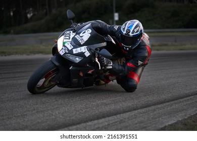 10-05-2020 Ropazi, Latvia Motorcyclist At Sport Bike Rides By Empty Asphalt Road. Sport Bike.