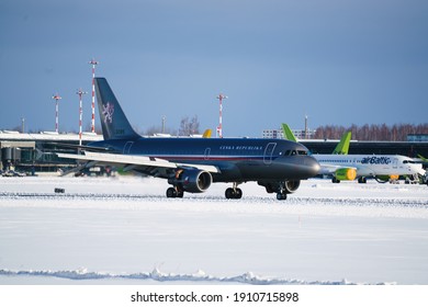 10-10-2020 RIga, Latvia Airplain Is Flying At Blue Sky