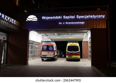 10.20.2021 Wroclaw, Poland, Night Hospital Emergency Room With An Ambulance In The Driveway.