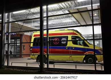 10.20.2021 Wroclaw, Poland, Night Hospital Emergency Room With An Ambulance In The Driveway.