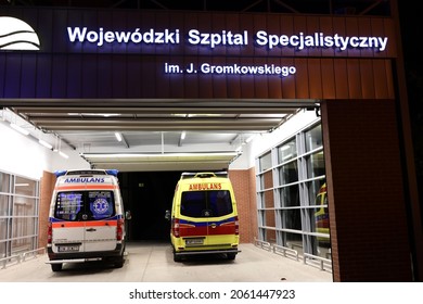 10.20.2021 Wroclaw, Poland, Night Hospital Emergency Room With An Ambulance In The Driveway.