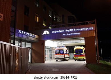 10.20.2021 Wroclaw, Poland, Night Hospital Emergency Room With An Ambulance In The Driveway.