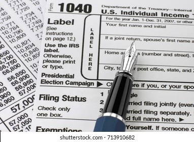 1040 Tax Form And Pen