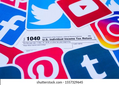 1040 U.S. Individual Income Tax Return Form With Printed Logo Of Many Social Networks. Facebook Instagram Youtube Tumblr Twitter Pinterest