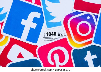 1040 U.S. Individual Income Tax Return Form With Printed Logo Of Many Social Networks. Facebook Instagram Youtube Tumblr Twitter Pinterest