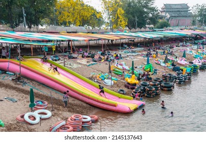 10-APRIL-2019 - Songkran Day, people come to have enjoying at the Ping River. Kamphaeng Phet Province, Thailand.