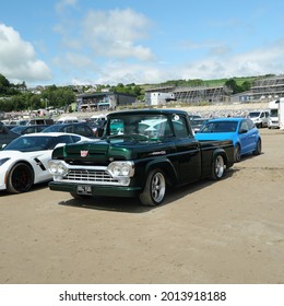 10th July 2021- A Beautifully Restored Ford F Series Pickup Truck, Built In 1960, Parked On The Sandy Beach At Pendine, Carmarthenshire, Wales, UK.