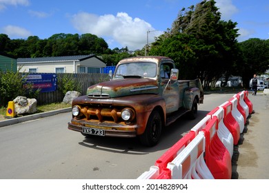 10th July 2021- An Old Ford F Series Pick-up Truck Being Driven Towards The Beach At Pendine, Carmarthenshire, Wales, UK.