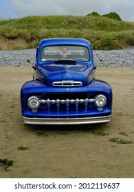 10th July 2021- A Stylish Ford F Series Pick-up Truck, Dating From The 1940's,50's, Parked On The Sandy Beach At Pendine, Carmarthenshire, Wales, UK.