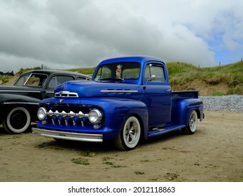 10th July2021- A Stylish Ford F Series Pick-up Truck Parked On The Sandy Beach At Pendine, Carmarthenshire, Wales, UK.