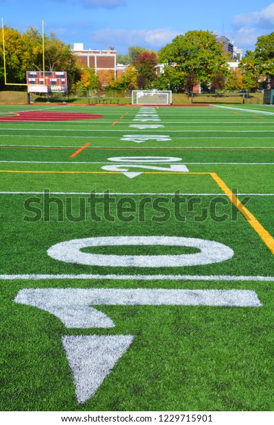 The 10-yard-line of an american football field with
artificial turf