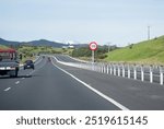 110 kmh road sign at Waikato Expressway. New Zealand. 