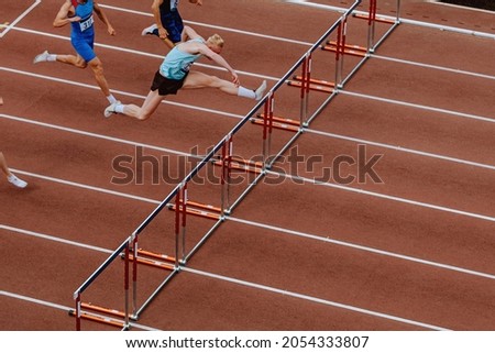 110 meter hurdles race men athletes athletics competition