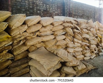 11/01/2018, Odisha, India - Stack Of Plastic Sack Of Cement In A Factory.