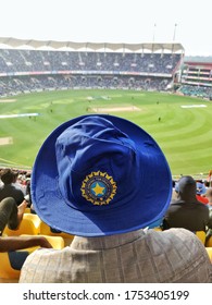 11/01/2018-Trivandrum, India: Man Watching A Cricket Match Wearing Blue Indian Cricket Association Cap Supporting Team India In Greenfield International Stadium, Trivandrum, India..
