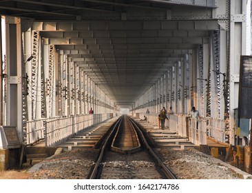 11/02/2020 . Guwahati , India . People Working On Saraighat Railway Bridge .