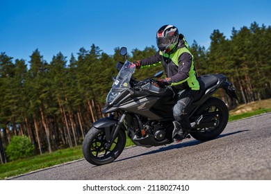 11-05-2020 Riga, Latvia Motorcyclist At Sport Bike Rides By Empty Asphalt Road. Sport Bike. MotoGP Race. Superbikes. Motorbikes Racing