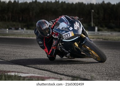 11-05-2020 Riga, Latvia Motorcyclist At Sport Bike Rides By Empty Asphalt Road. Sport Bike.