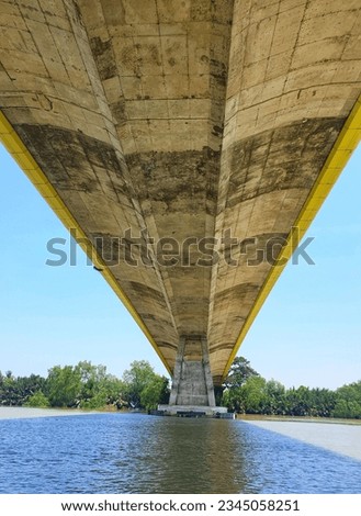 11.08.2023 the underside of a bridge over a body of water, sitting under bridge, under bridge, the infrastructure of humanity, a cathedral under an overpass, solid concrete, high bridges, underbody,
