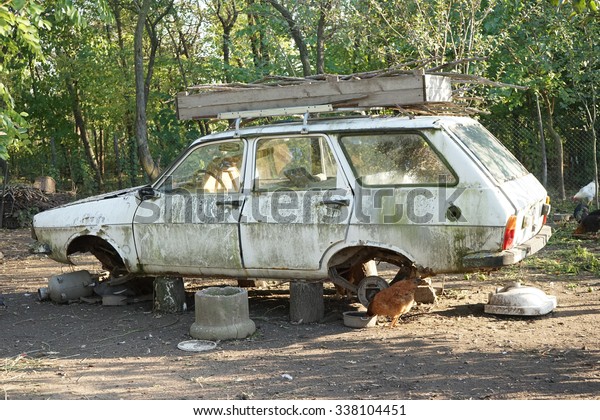 1.11.2015, RESCA, ROMANIA,\
Illustrative, editorial photo of an old Dacia, romanian car and\
symbols
