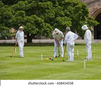 11th June, 2017. A game of Croquet on the Bishop's Palace lawn, Wells, Somerset.