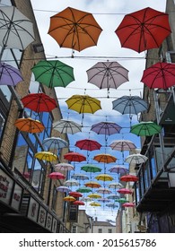 11th June 2021 Dublin, Ireland. Side Street off Grafton Street called Anne's Lane with an umbrella street display outside Zozimus Bar. 