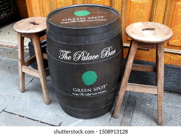 11th September 2019, Dublin, Ireland. The Palace Bar Green Spot Single Pot Still Irish Whiskey Barrel With Two Wooden Stools Outside The Palace Bar On Fleet Street, Temple Bar.  